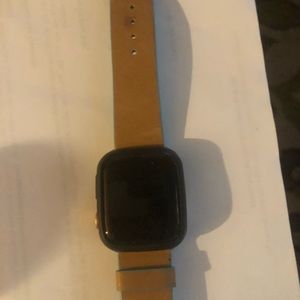 Apple Watch… has some scratches. Works fine Unlocked. Comes with 4 extra bands